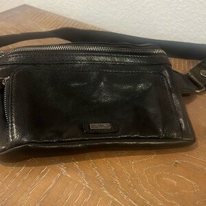 Spikes and Sparrows Cross Body adjustable bag.